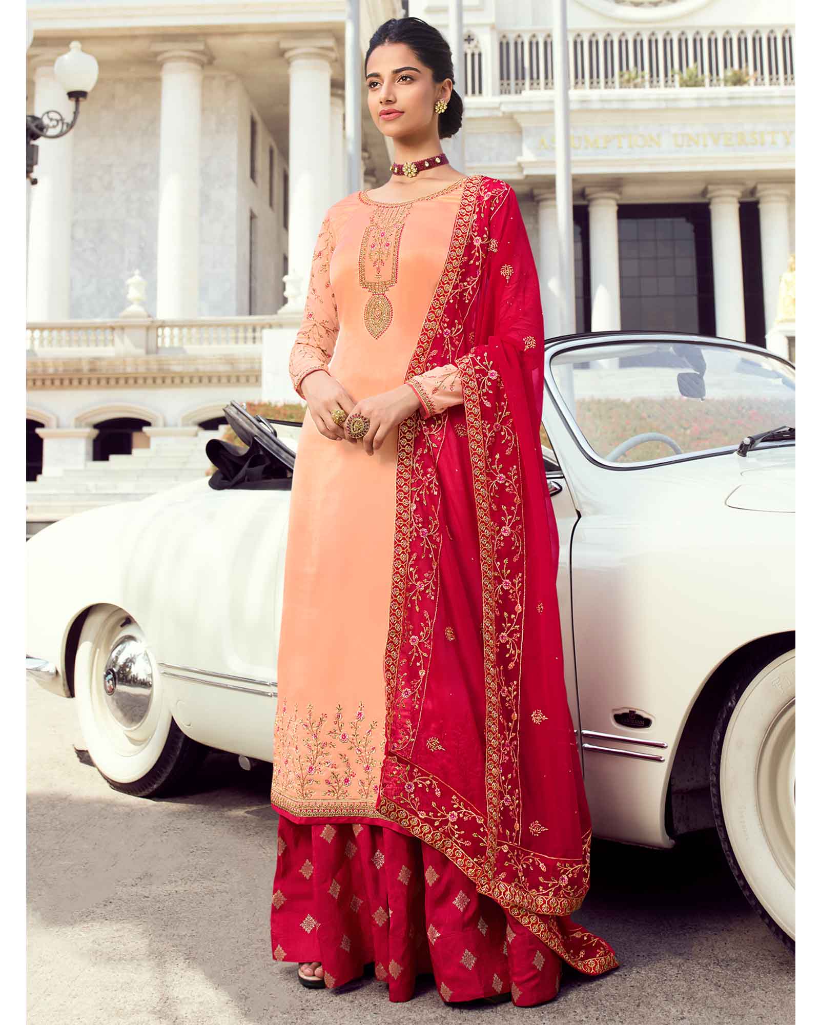 Peach Colored Party Wear Embroidered Georgette Satin Lehenga Kameez