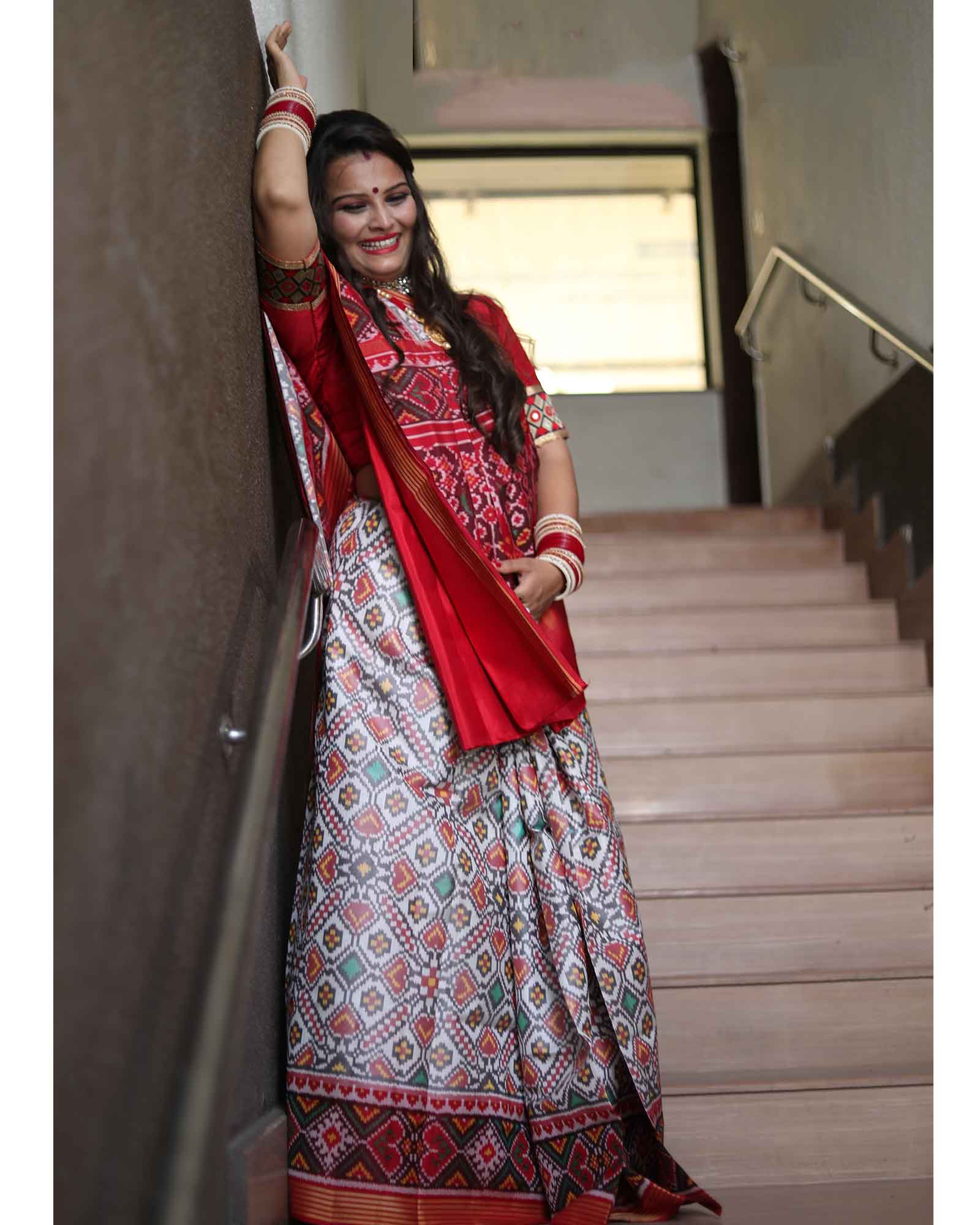 Handcrafted White Color Traditional Patola Saree with Small Cheks Tissue Border 