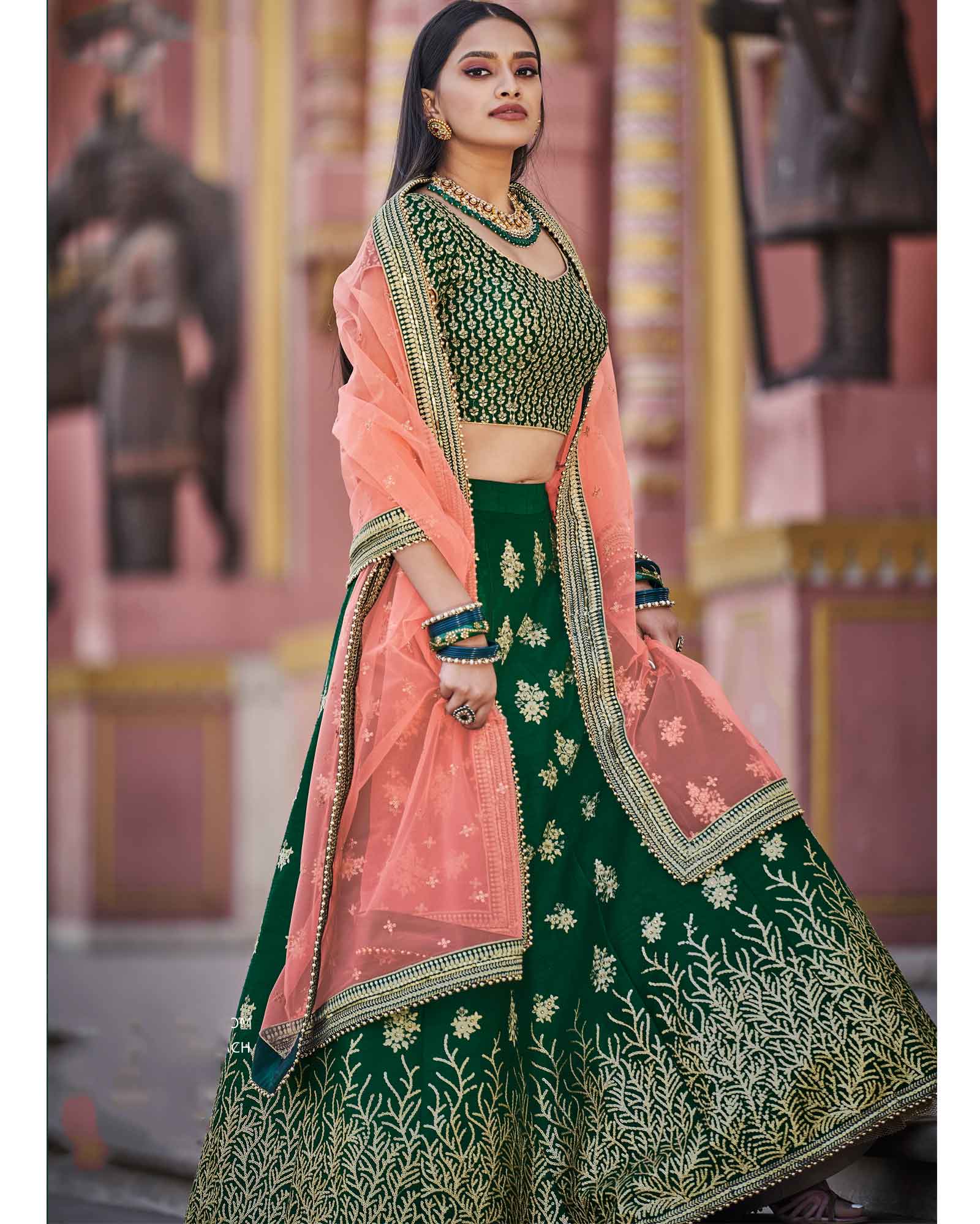 Bottle Green Handloom Silk Lehenga Blouse With Peach Net Dupatta